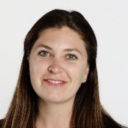 Arielle against a light background